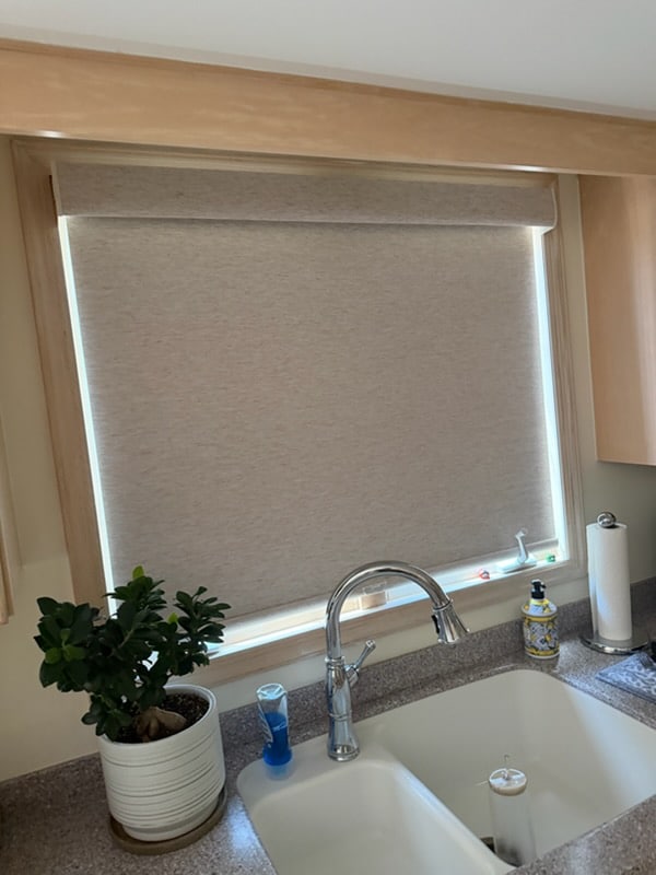 Roller shade over a kitchen window in a Kinnelon, Morris County NJ home