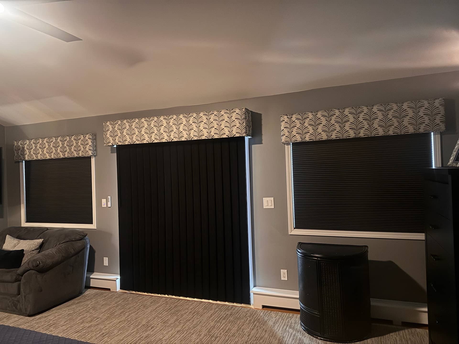 Cellular shades and motorized drapes in a Kinnelon, New Jersey media room