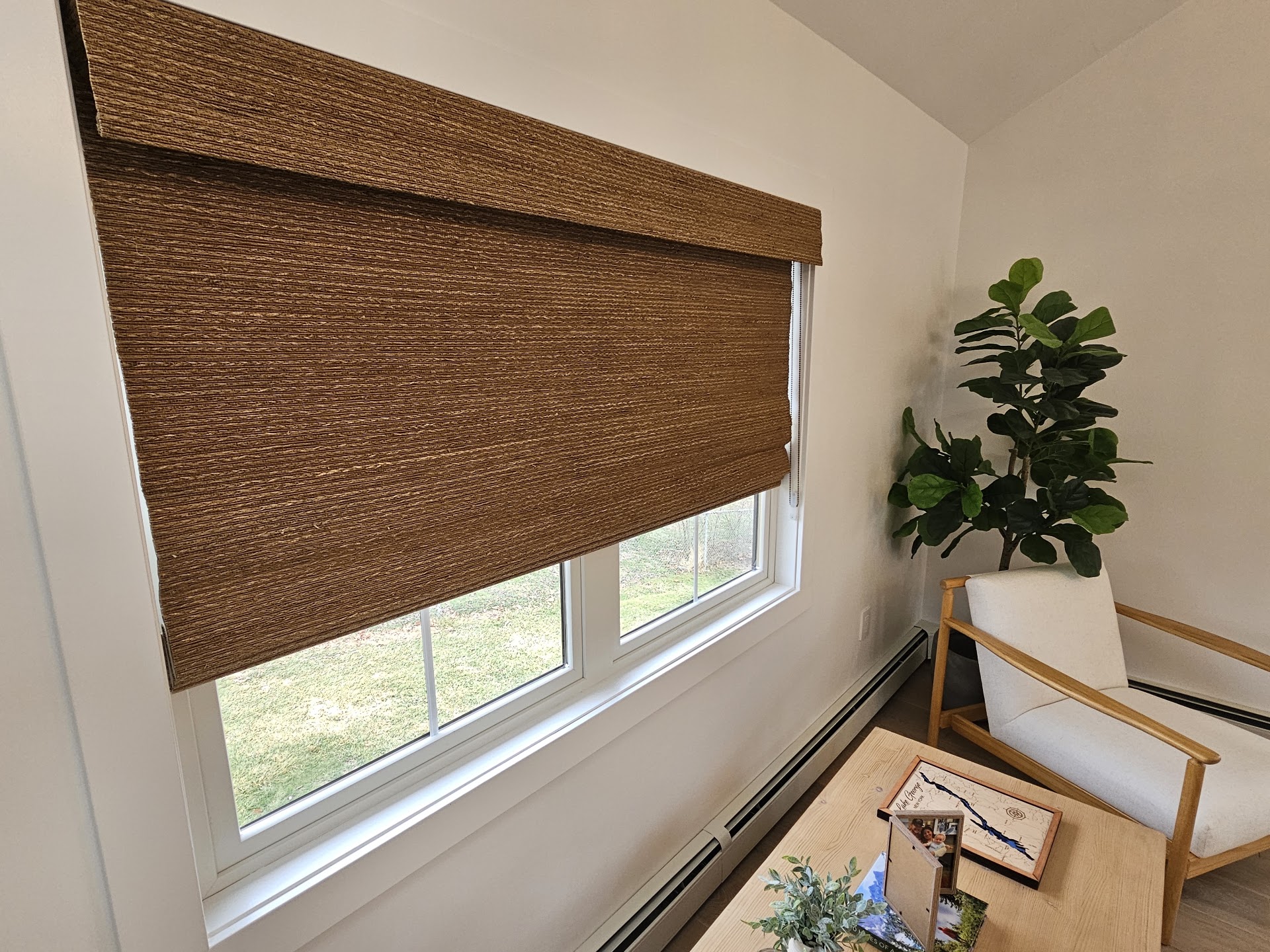 Natural woven wood shades in a Whippany, Morris County NJ media room